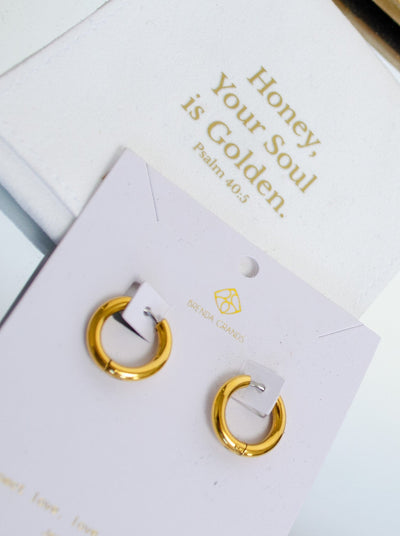 Gold hoop earrings.