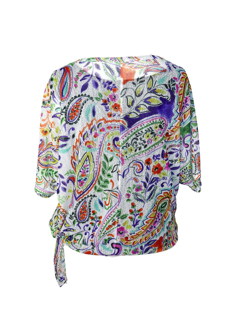 Paisley and floral multi color printed short sleeve blouse with a tie on the left hip.