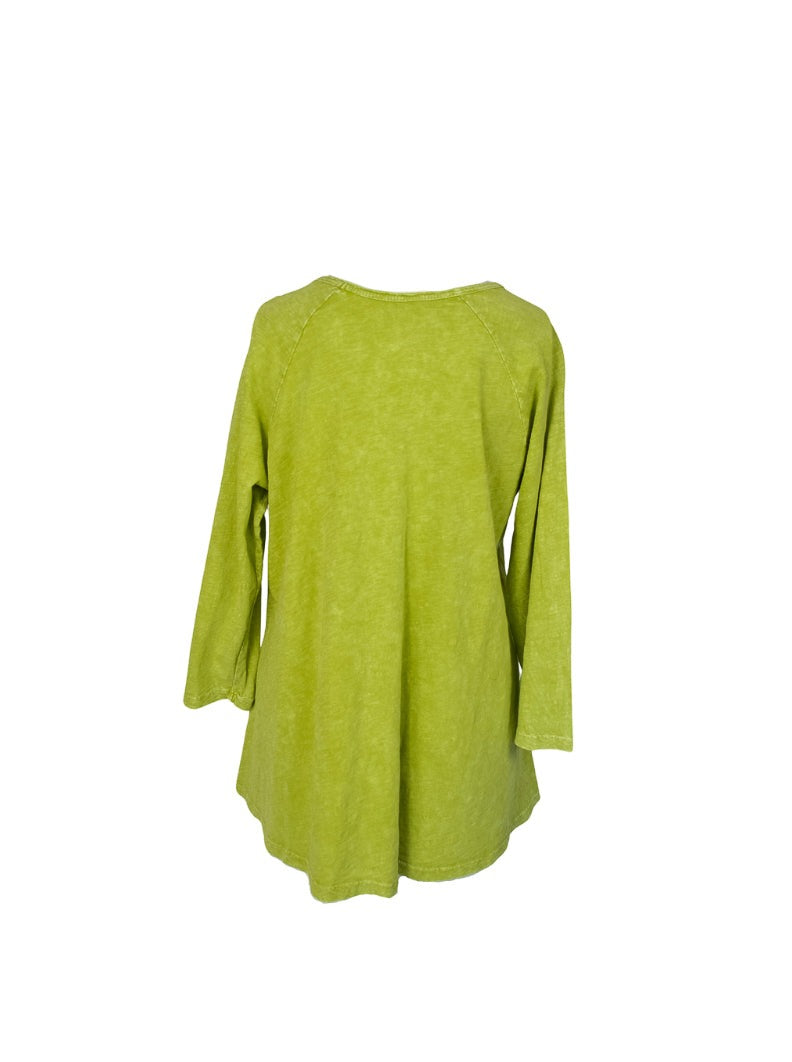 Green 3/4th sleeve tunic top with floral detail and pockets in front.