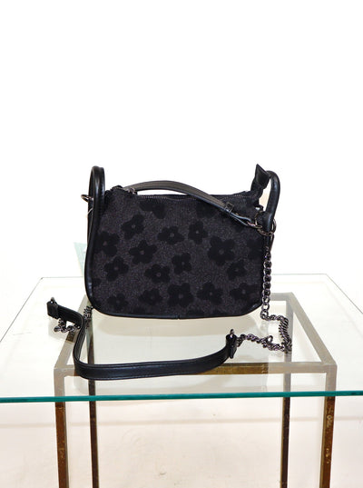 Black floral crossbody shoulder bag.