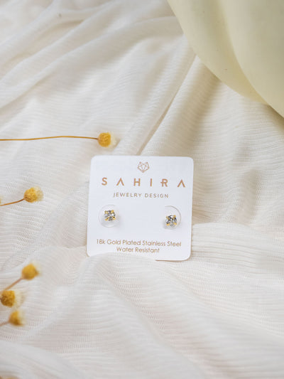 A pair of 4mm gold CZ stone studs.
