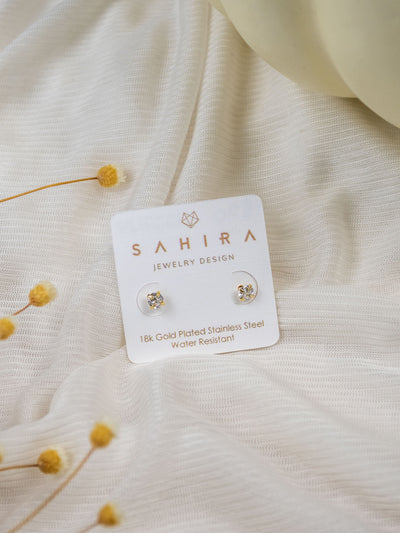 A pair of 4mm gold CZ stone studs.