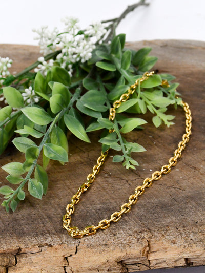 A short, gold chain necklace with tight links.