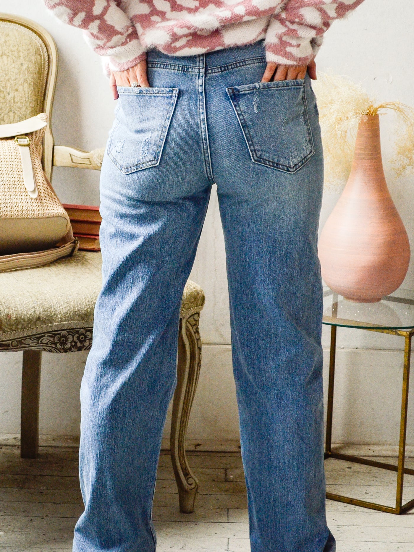 A light wash jean that is wide leg and high rise.