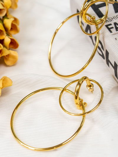 A gold double hoop statement earring.
